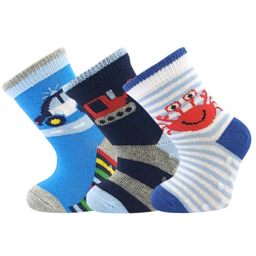Three pairs of children's socks with different designs on a blue background